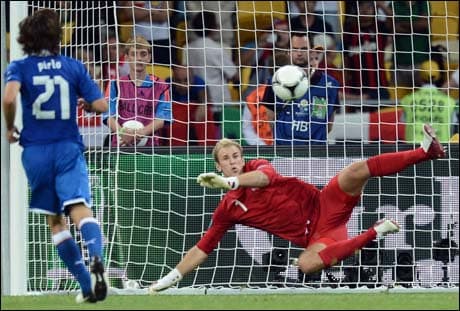 Italian midfielder Andrea Pirlo kicks and scores a penalty