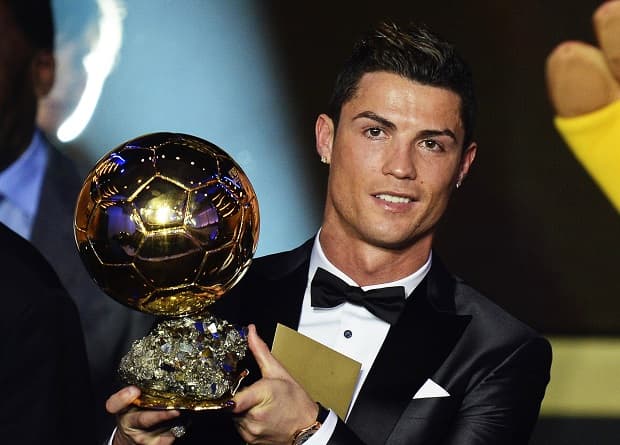 Portuguese striker Cristiano Ronaldo receives the FIFA Men's World Player of the Year 2013 award