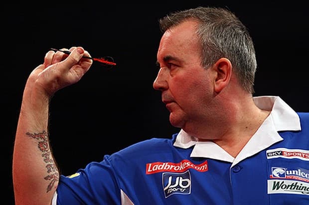Phil Taylor playing darts