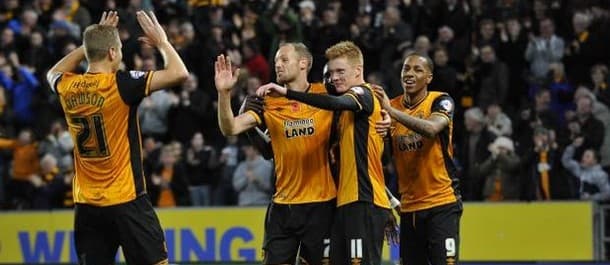 Hull beat Middlesbrough 3-0 to go top of the table.