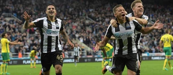 Newcastle score twice in injury time to beat Norwich 4-3.