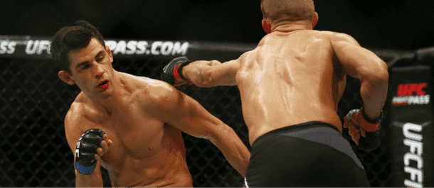 Dominick Cruz evades TJ Dillawshaws strikes