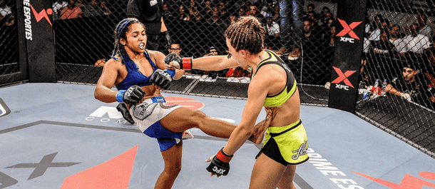 Viviane Pereira kicks her opponent