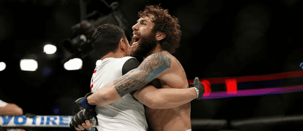 Michael Chiesa Celebrates after defeating Beneil Dariush