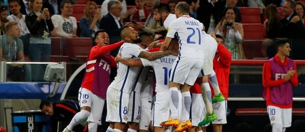 Chile beat Cameroon 2-0 in their Confederations Cup opener.