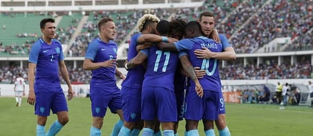 Dutch players celebrate during the 2-1 win over Monaco.