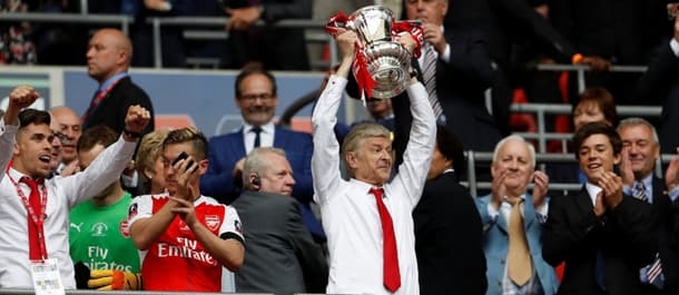 Arsene Wenger lifts the FA Cup for Arsenal in 2017.