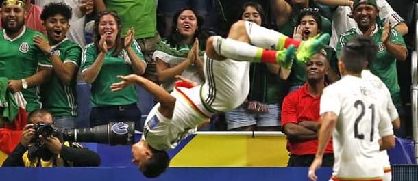 Mexico's players celebrate a 2-0 victory over Curacao.