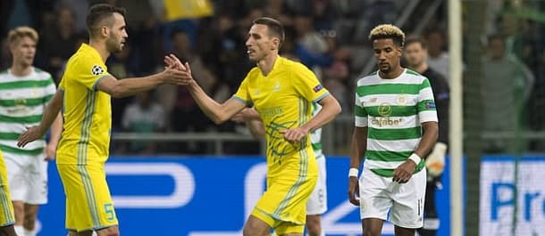 Astana beat Celtic 4-3 at home in a Champions League qualifier.