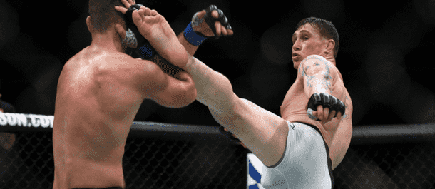 Darren Till slams a kick into Jessin Ayari - now gets ready for Donald Cerrone