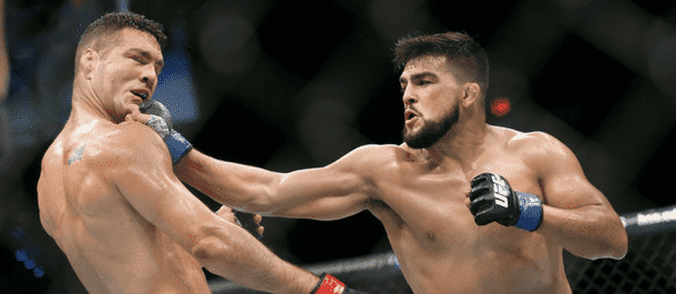 Kelvin Gastelum lands a blow on Chris Weidman