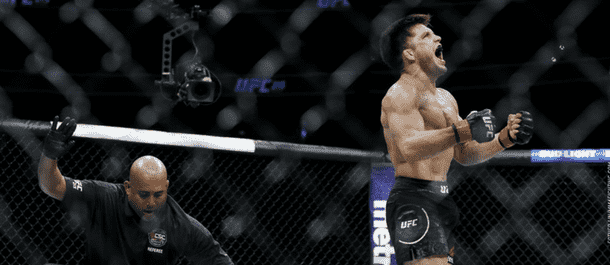 Henry Cejudo celebrates a UFC victory