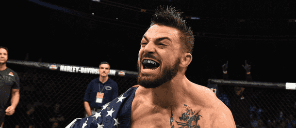 Mike Perry celebrates after UFC win