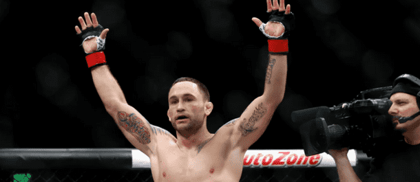 Frankie Edgar celebrates victory