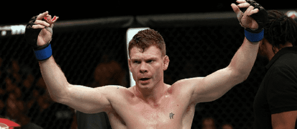 Paul Felder celebrates a UFC victory