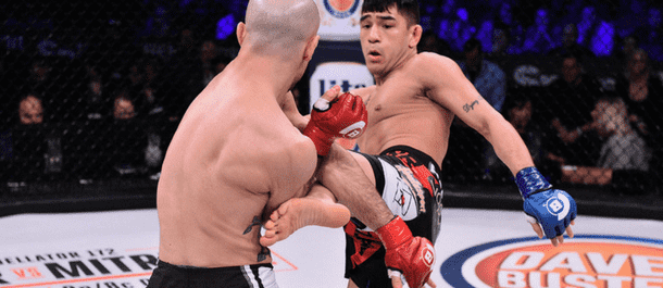 Emmanuel Sanchez kicks his opponent in Bellator