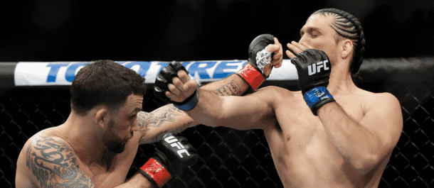 Frankie Edgar lands a shot on Brian Ortega