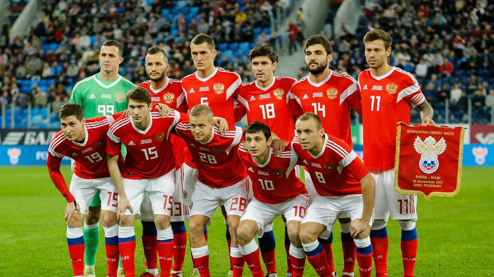 The Russia national football team posing after national anthem