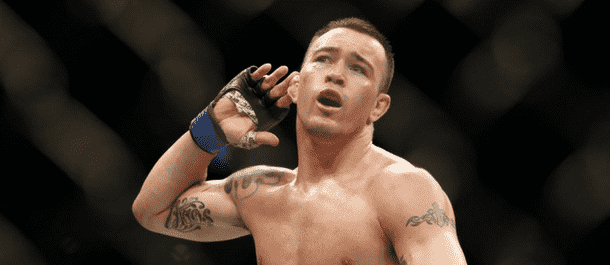 Colby Covington taunts the crowd after a UFC win