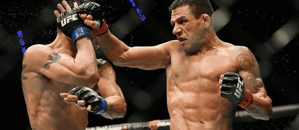 Rafael Dos Anjos connects with a spinning back fist