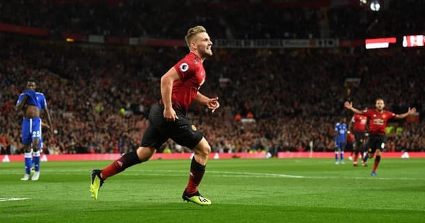 Luke Shaw scored his first senior goal as Manchester United won 2-1 at home to Leicester.