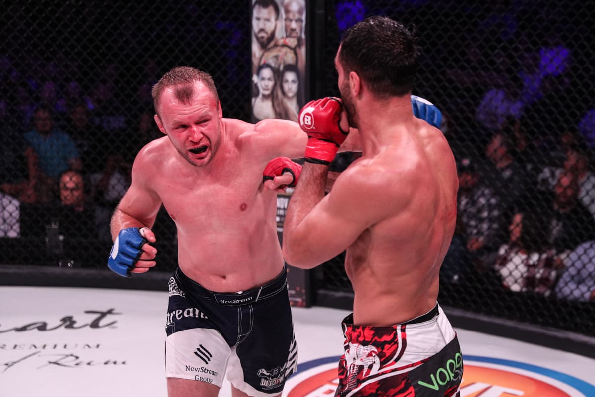 Alexander Shlemenko attempts to land a left hook on Gegard Mousasi