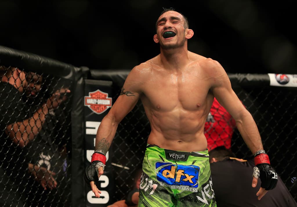 Tony Ferguson celebrates after defeating Abel Trujillo in their fight during the UFC 181 event at the Mandalay Bay Events Center on December 6, 2014 in Las Vegas, Nevada.