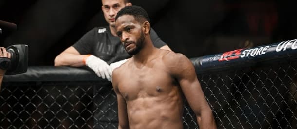 Neil Magny patiently waits inside the octagon before his UFC bout