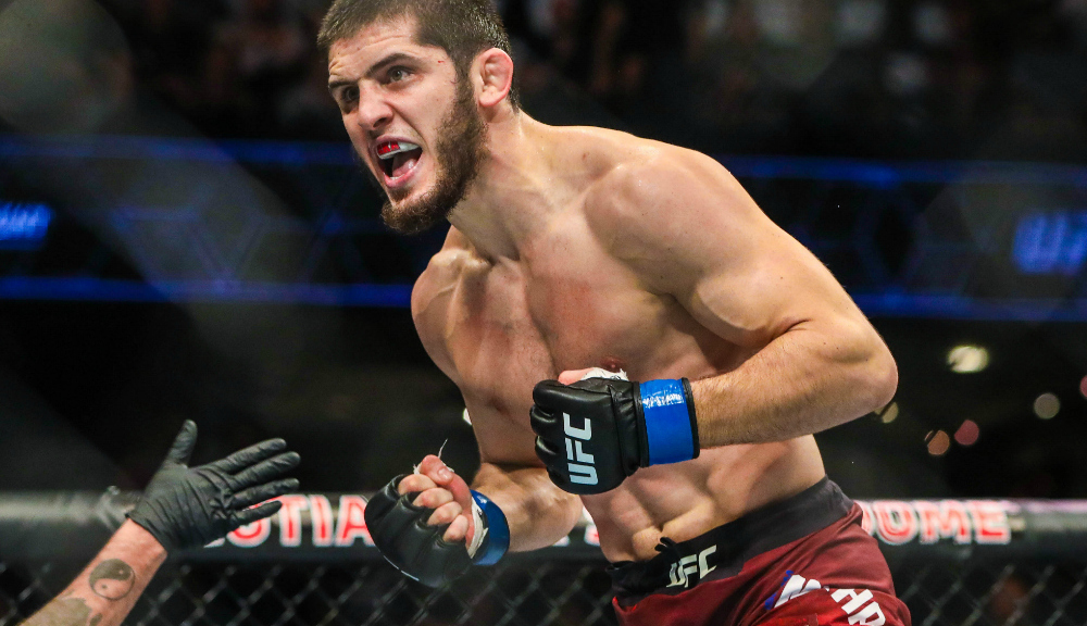 Islam Makhachev celebrates after his UFC win