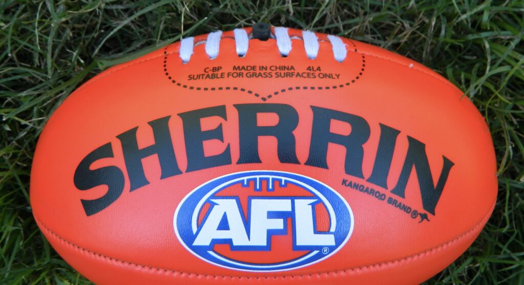 Sherrin AFL ball on grass