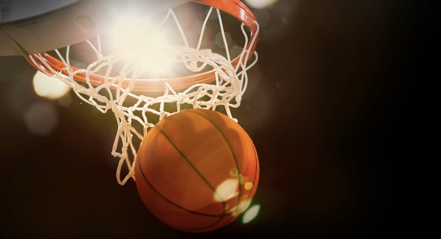 Basketball falling through hoop Basketball falling through hoop