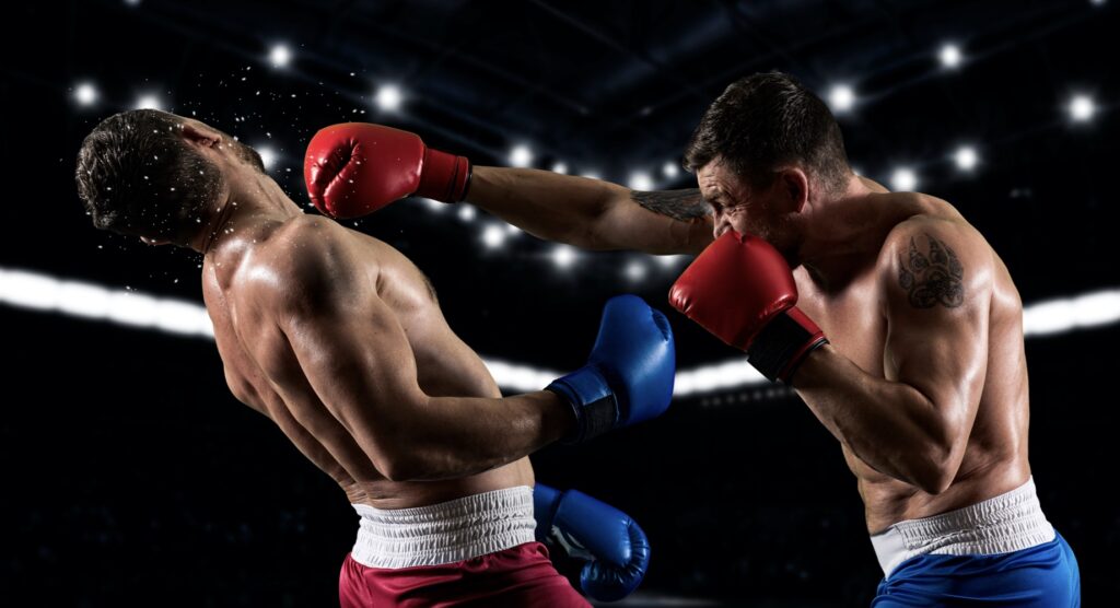 Boxer landing a punch on opponent's face