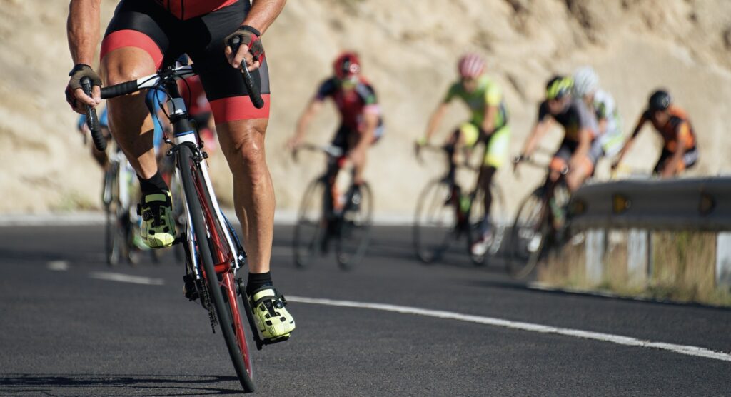 View of cyclists chasing leader during a race