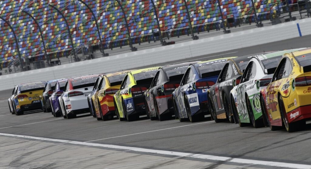 Cars lined up ahead of NASCAR race commencing