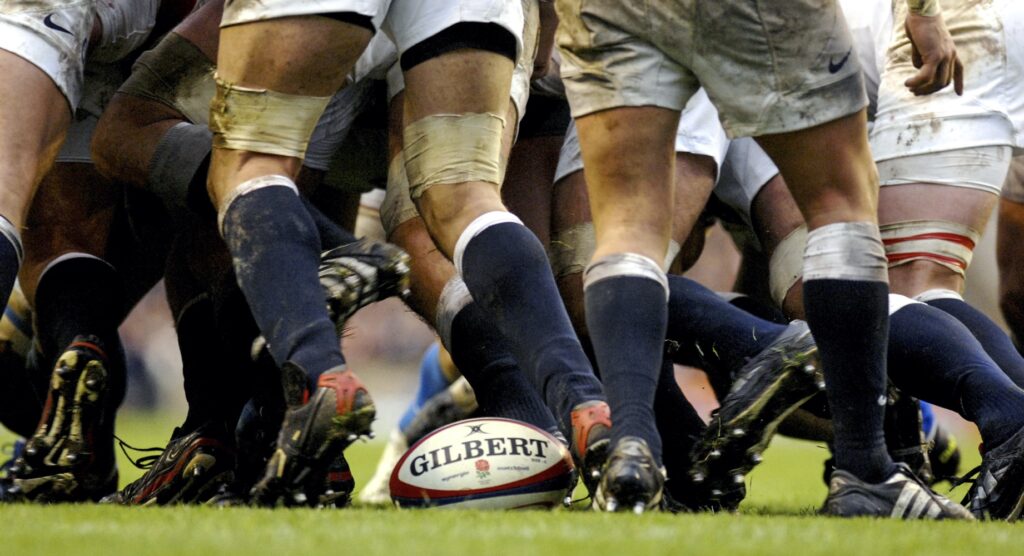 Rugby union players competing in scrum