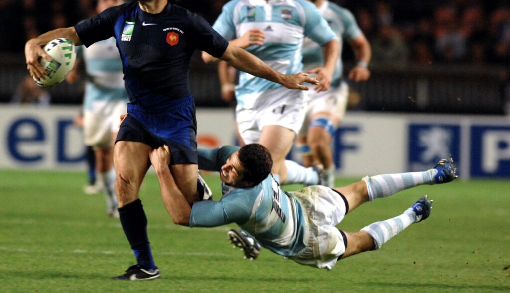 Rugby player making a tackle