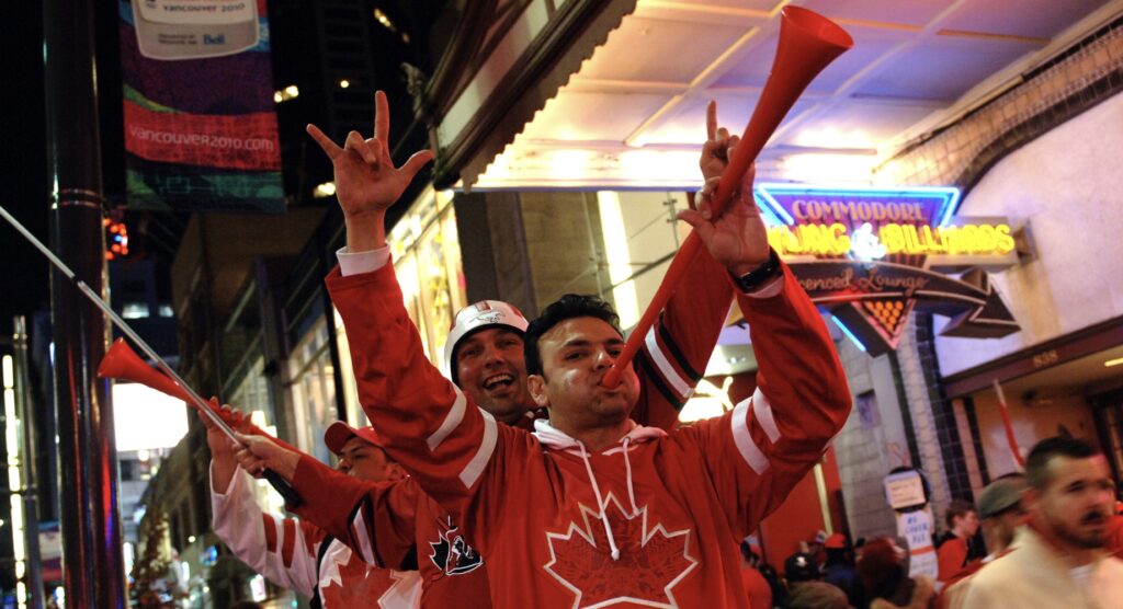 Canada supporter blowing horn