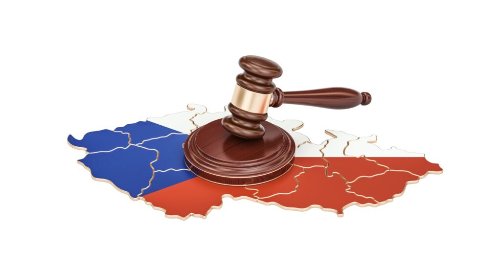 Wooden gavel on map of Czech Republic