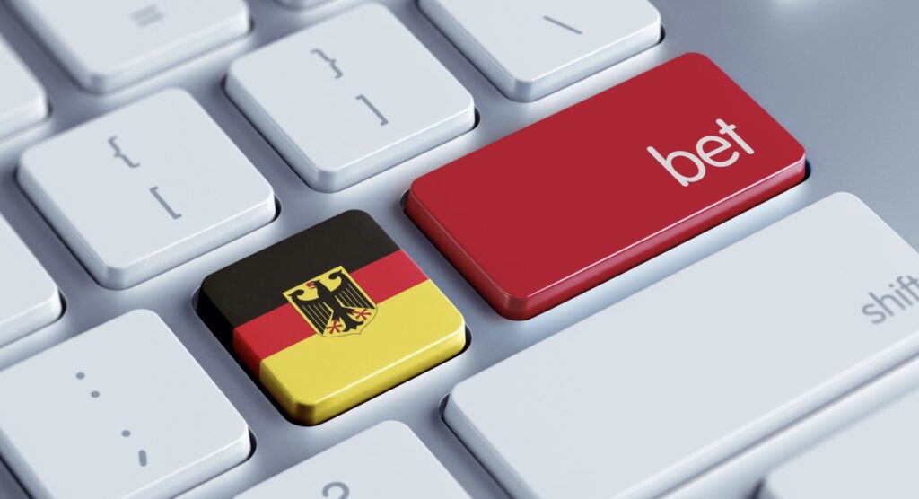 German flag and bet keys on computer