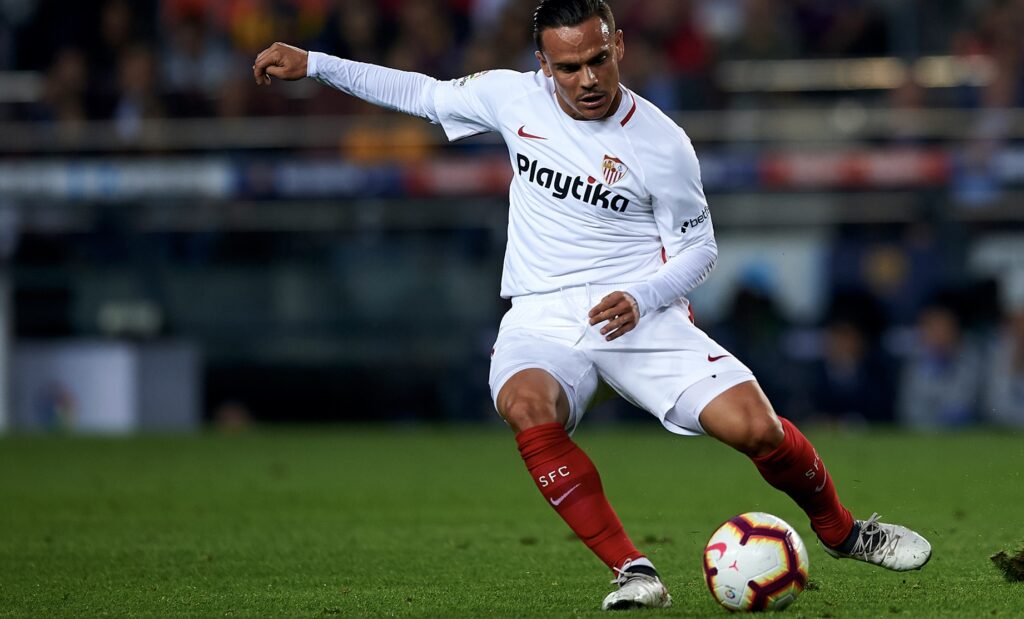 Sevilla player kicking the ball