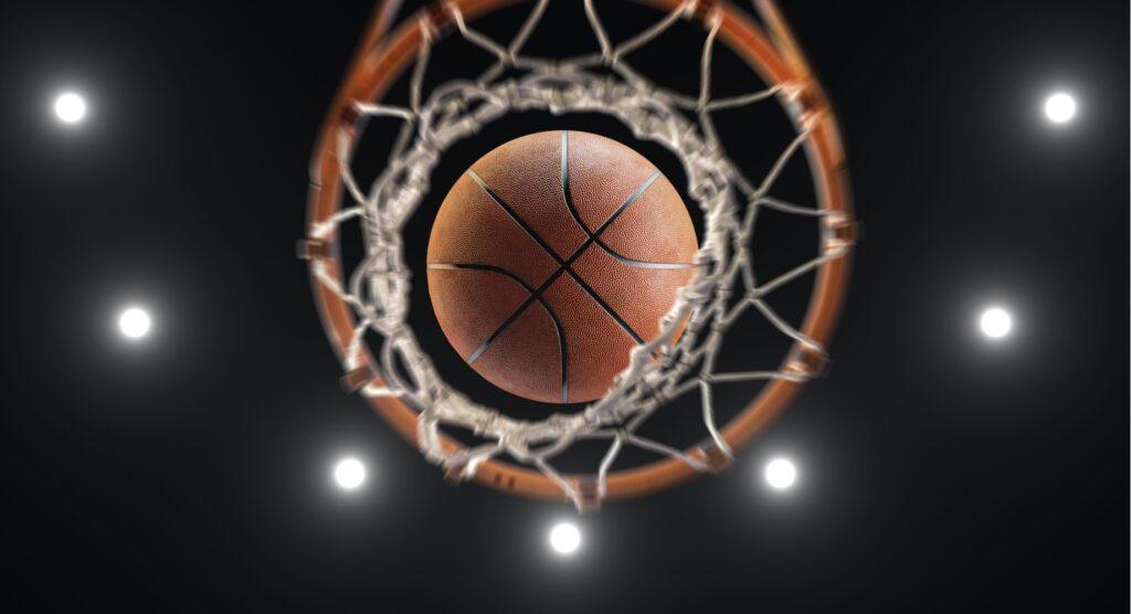 Basketball falling through net