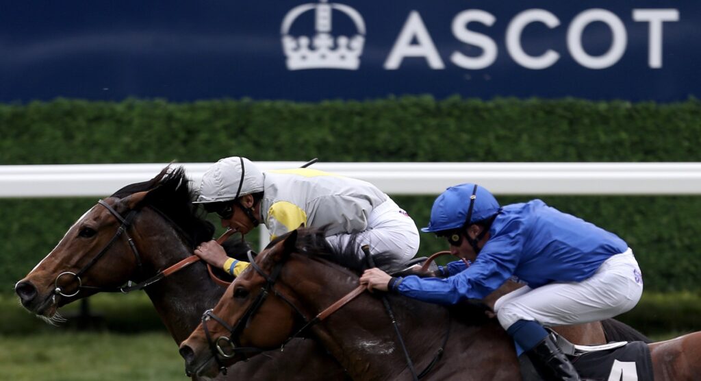 Two horses racing during Royal Ascot