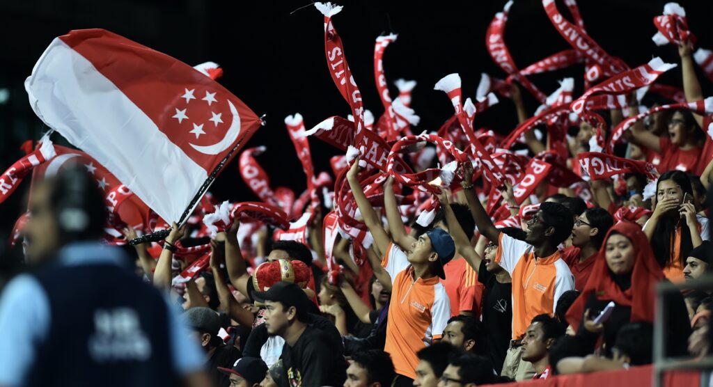Singapore fans celebrating in stadium