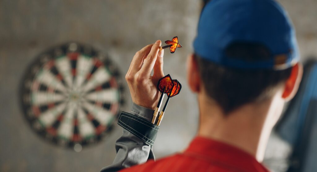 Man playing darts