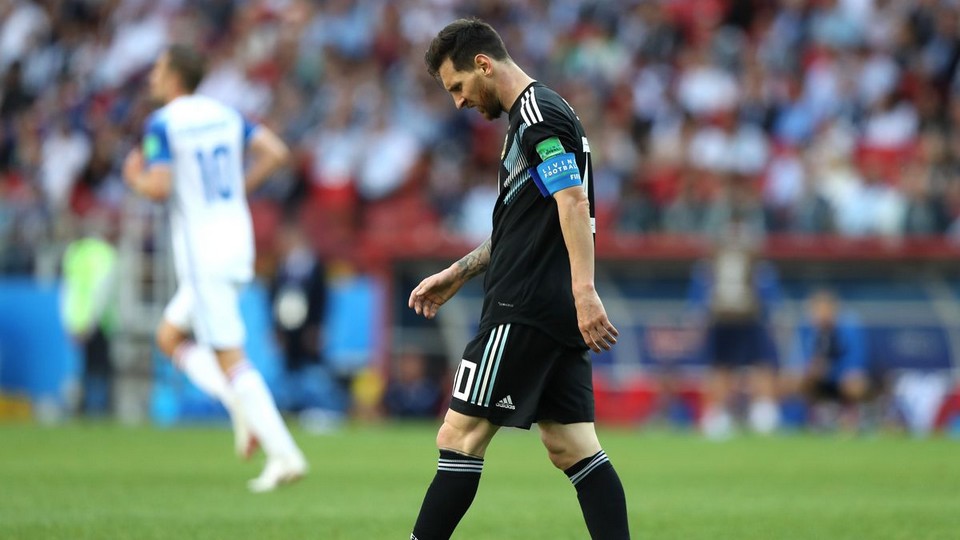 Lionel Messi bows his head after missing penalty for Argentina