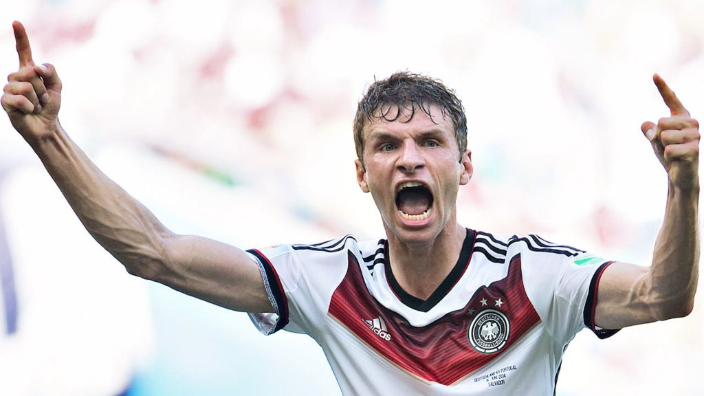 Thomas Müller celebrating after scoring for Germany