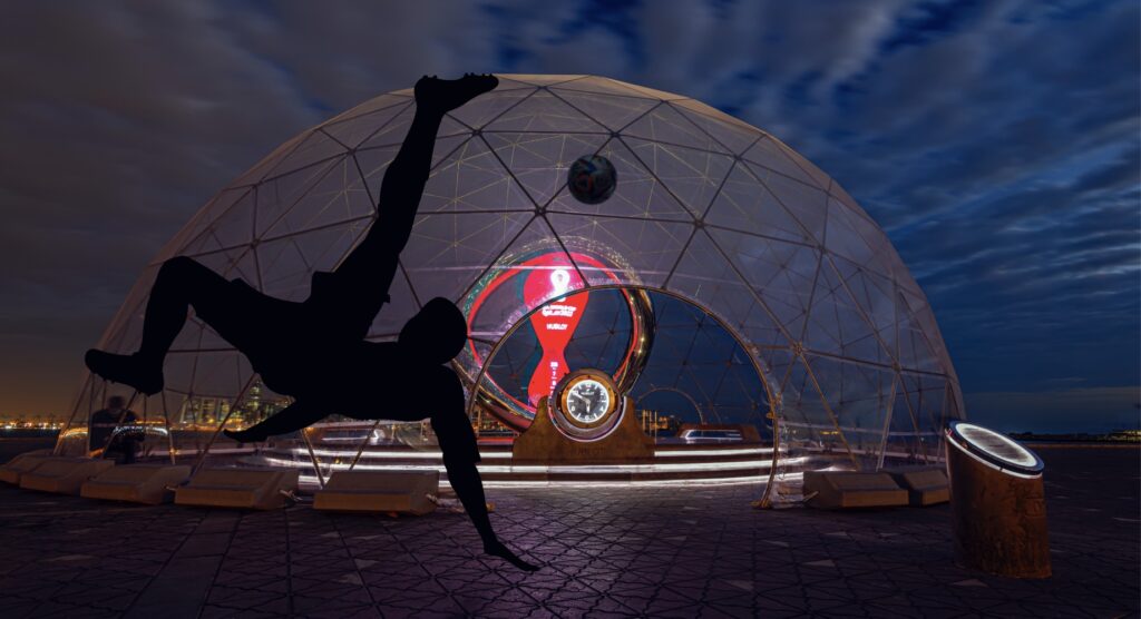 Overhead kick in front of FIFA World Cup 2022 Countdown Clock