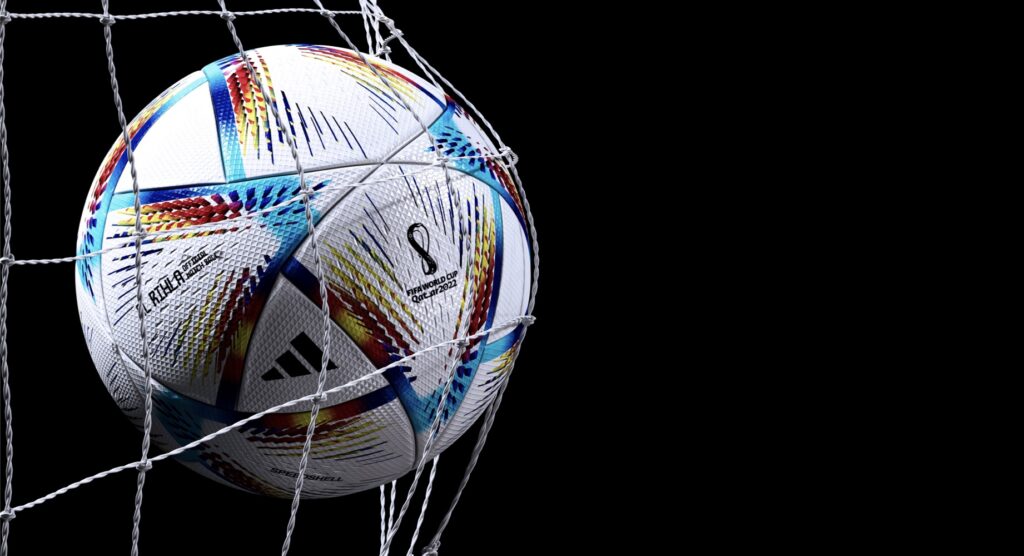 Official match ball of Qatar 2022 hitting back of the net