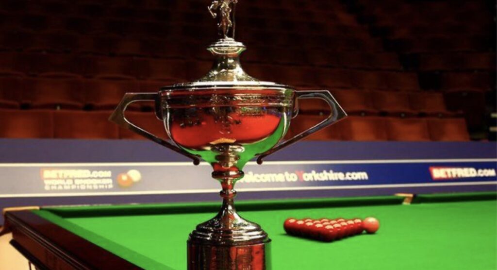 World Snooker Championship trophy on edge of table