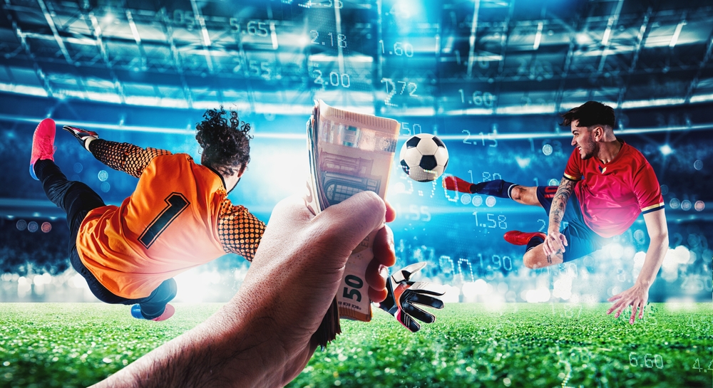 Football match with betting odds and cash overlay Footballers competing in a stadium with betting odds and banknotes overlaid